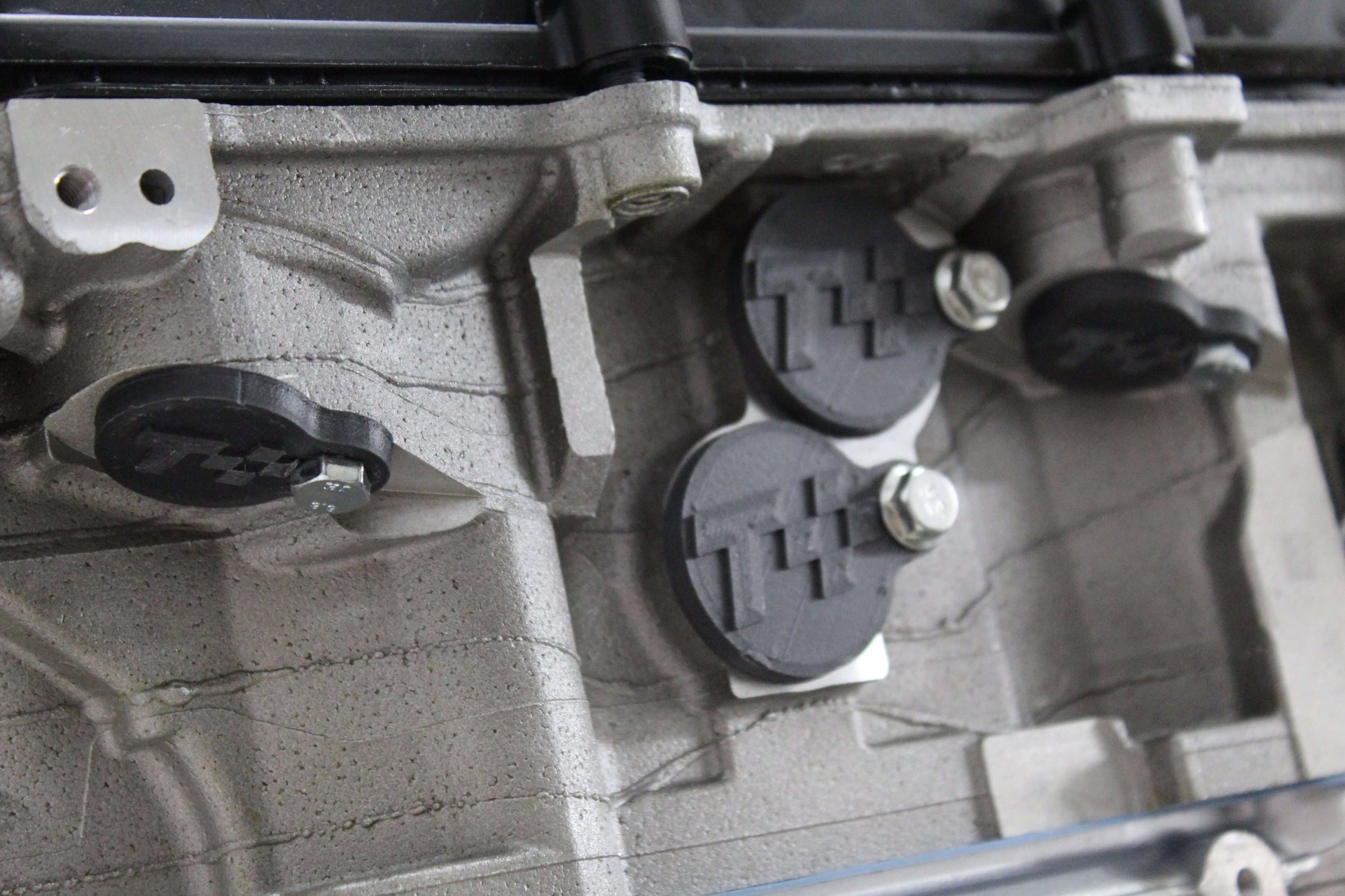 N52 Injector Port & Sensor Cover Kit installed on engine, showcasing durable carbon-infused ABS covers for protection.